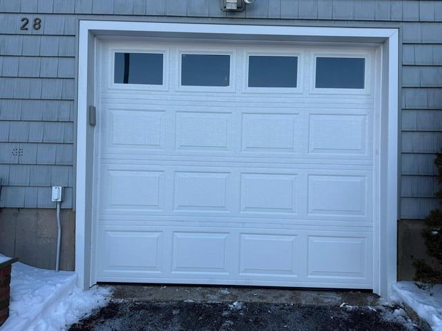 Garage door serviced by Pro Line in winter