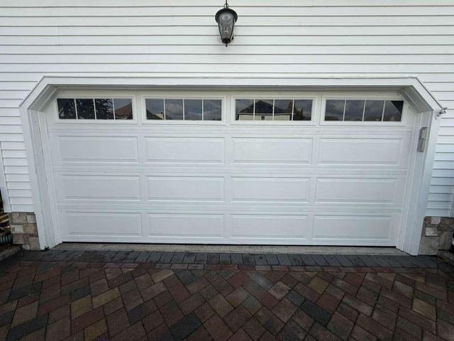 Wide double garage door with windows